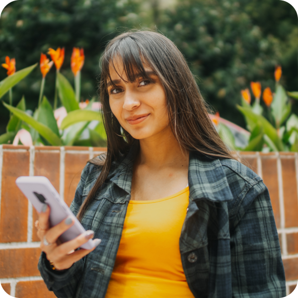 Student holding a mobile phone